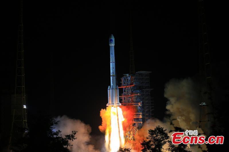 China\'s home-grown global satellite navigation system came a step closer to completion with the launch of another BeiDou-3 satellite at 11:57 p.m. Thursday from the Xichang Satellite Launch Center, in the southwestern Sichuan Province. Launched on a Long March-3B carrier rocket, it is the 41st of the BeiDou navigation system, and will work with 16 other Beidou-3 satellites already in orbit. It is also the first BeiDou-3 satellite in high orbit, about 36,000 km above the Earth. In a geostationary orbit, following the Earth\'s rotation, it will view the same point on Earth continuously. (Photo: China News Service/Liang Keyan)