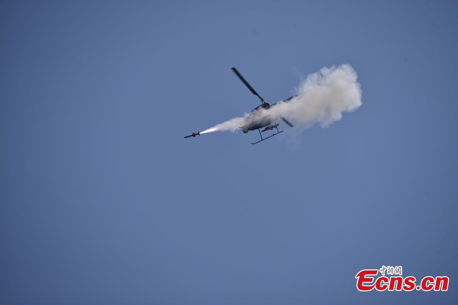 China successfully launched a missile from an unmanned attack helicopter AV500W, with the projectile hitting a target 4.5 kilometers from the aircraft. The aircraft, developed and produced by the Aviation Industry Corp of China, the State-owned aircraft giant, has a maximum takeoff weight of 500 kilograms, a maximum speed of 170 kilometers per hour and a flight ceiling of 5,000 meters.(Photo: China News Service/He Huan)