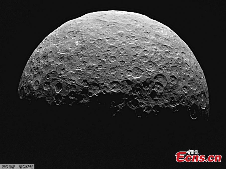 This photo from a sequence of images provided by NASA, taken from the Dawn spacecraft of Ceres, a dwarf planet located in the asteroid belt between Mars and Jupiter. NASA said the start of science observations was slightly delayed because of a communication glitch. The space agency said the delay won’t affect the overall mission. （Photo/Agencies）