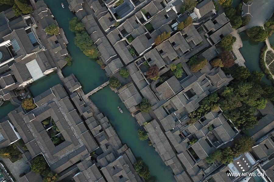 <?php echo strip_tags(addslashes(Aerial photo taken on Oct. 31, 2018 shows the scenery of Xizha scenic spot within Wuzhen, east China's Zhejiang Province. The fifth World Internet Conference (WIC) is scheduled to run from November 7-9 in the river town of Wuzhen. (Xinhua/Huang Zongzhi))) ?>