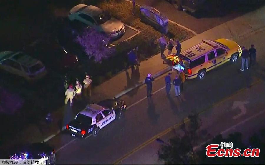 In this image made from aerial video, police vehicles block an intersection in the vicinity of a shooting in Thousand Oaks, California, early Thursday, Nov. 8, 2018. At least 12 people were killed and multiple people were injured after a man opened fire in Southern California bar late Wednesday. The gunman killed himself at the spot. (Photo/Agencies)