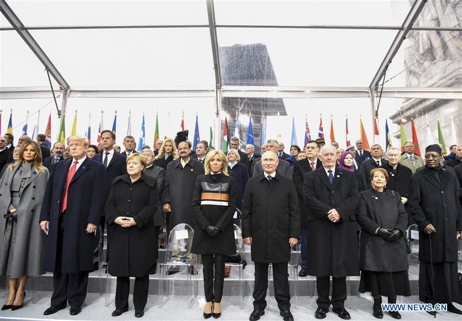 Russian President Vladimir Putin (4th R, Front), German Chancellor Angela Merkel (3rd L, Front) and U.S. President Donald Trump (2nd L, Front) attend a ceremony to mark the centenary of the Armistice of the First World War in Paris, France, Nov. 11, 2018. (Xinhua/Chen Yichen)