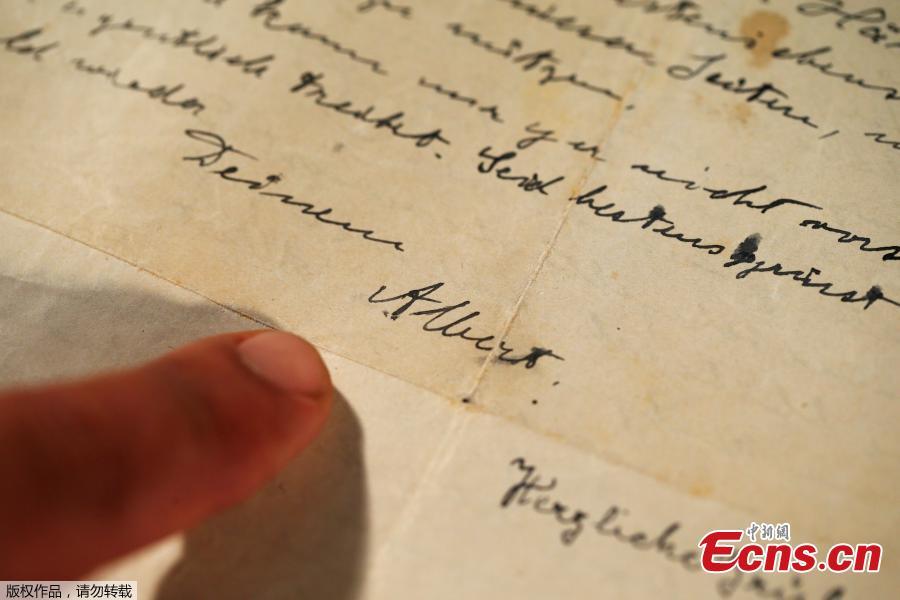 <?php echo strip_tags(addslashes(Meron Eren from Kedem Auction House shows a letter written in 1922 by physicist Albert Einstein, prior to its auction, in Jerusalem November 12, 2018. (Photo/Agencies)
<br><br>
The letter in which Albert Einstein confided his fears of the rise of anti-Semitism in Germany, more than a decade before the Nazis took power, sold at an Israeli auction on Tuesday for $32,000.)) ?>