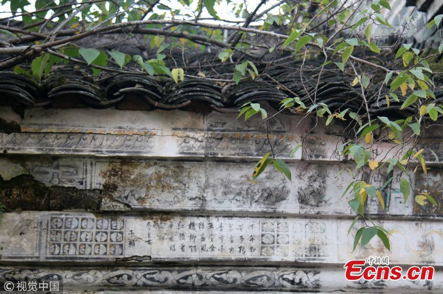 <?php echo strip_tags(addslashes(Ancient Chinese poetry and paintings are seen marked on wall of an old residential building in a village in East China's Jiangxi province. The building was constructed during the reign of Emperor Guangxu (1875-1908).  Colors of characters and patterns on the wall of the 140-year-old building are still vibrant.  (Photo/VCG))) ?>