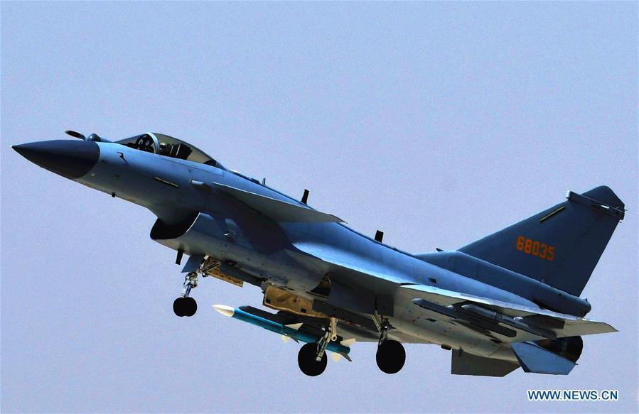 Photo taken on April 12, 2018 shows a J-10C fighter jet in a training. The Chinese Air Force announced a roadmap for building a stronger modern air force in three steps. The building of a stronger modern air force is in line with the overall goal of building national defense and the armed forces, Lieutenant General Xu Anxiang, deputy commander of Chinese Air Force, said at a press conference on celebrating the 69th anniversary of the establishment of Chinese Air Force held in Zhuhai, south China\'s Guangdong Province, Nov. 11, 2018. (Xinhua/Liu Chuan)