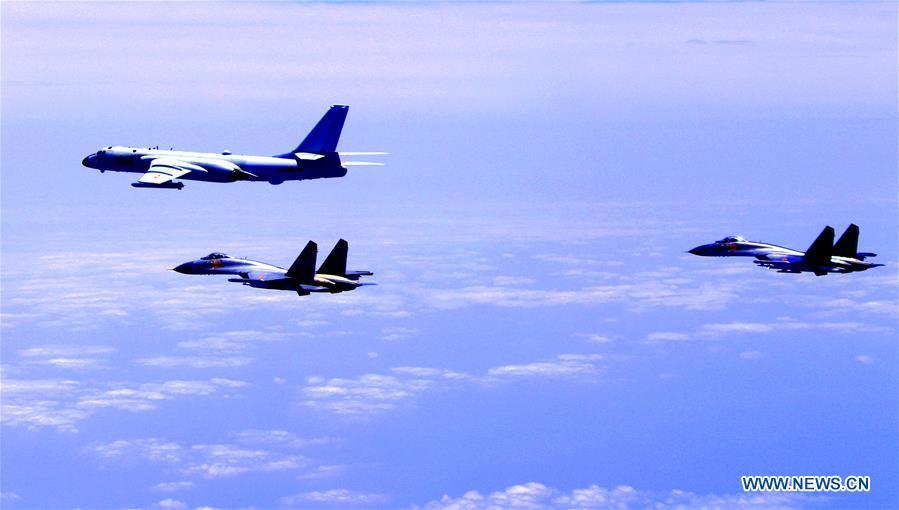 Chinese air force formation including H-6K bombers conduct island patrol in April 19, 2018. The Chinese Air Force announced a roadmap for building a stronger modern air force in three steps. The building of a stronger modern air force is in line with the overall goal of building national defense and the armed forces, Lieutenant General Xu Anxiang, deputy commander of Chinese Air Force, said at a press conference on celebrating the 69th anniversary of the establishment of Chinese Air Force held in Zhuhai, south China\'s Guangdong Province, Nov. 11, 2018. (Xinhua/Zhai Peisong)