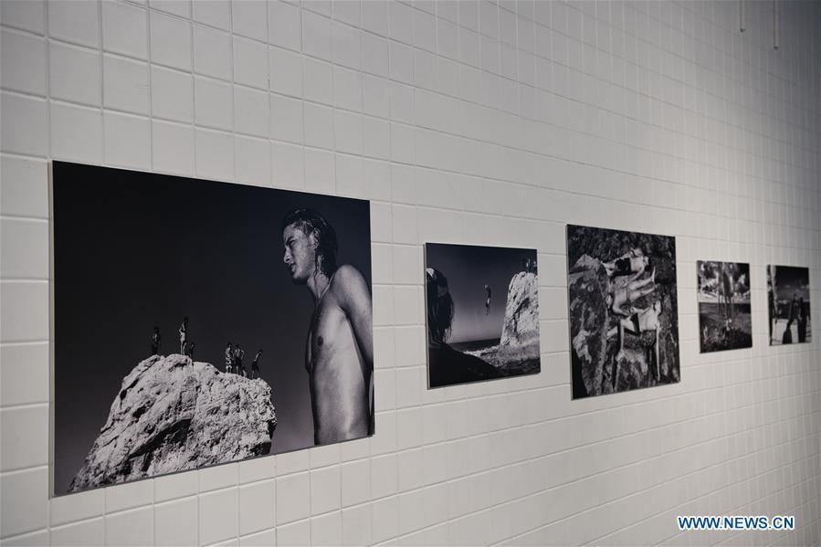 Photo taken on Nov. 19, 2018 shows photographs exhibited at the World Press Photo Exhibition 2018 at Dupont Underground in Washington D.C., the United States. The exhibition, which is held from Oct. 27 to Nov. 25, showcases the winning photographs from the 61st annual World Press Photo contest, which received over 70,000 photographs taken by 4,548 photographers. (Xinhua/Liu Jie)