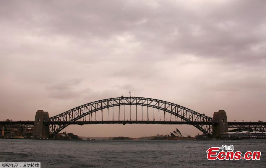 <?php echo strip_tags(addslashes(The Sydney Harbour Bridge and Sydney Opera House can be seen during a dust storm as it in descends upon the city of Sydney in Australia, November 22, 2018. (Photo/Agencies))) ?>