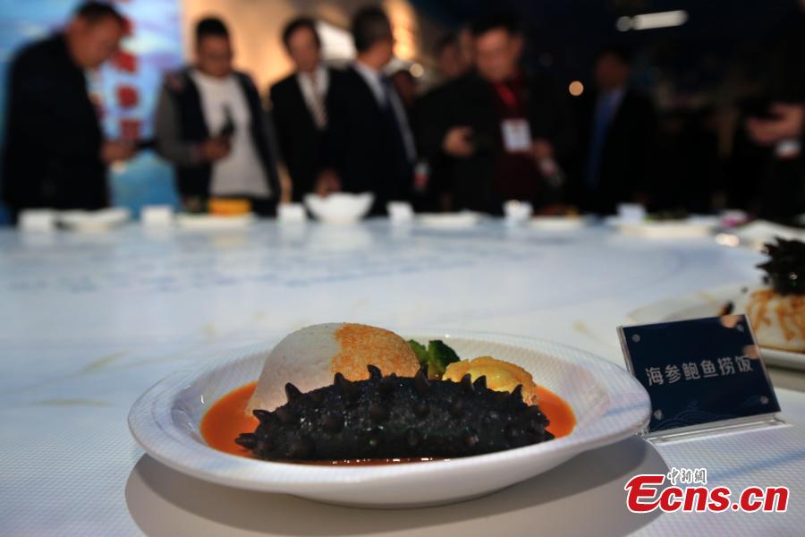 Different types of sea cucumbers are seen at a museum in Rongcheng, East China’s Shandong province. The sea cucumber museum, first of this kind in China, features over 100 specimens of the marine animal. The special museum also serves as a center for visitors to know more about the animal and its ecological role in the marine environment. (Photo: China News Service/ Wang Fudong)