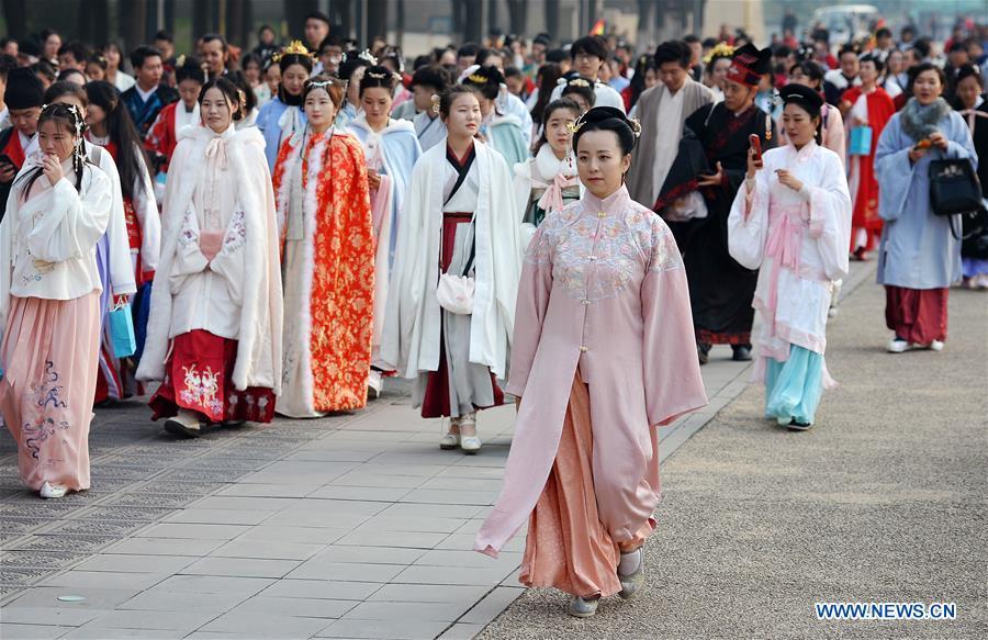 <?php echo strip_tags(addslashes(People wearing Hanfu, Chinese traditional costume, walk during an event at the Daming Palace National Heritage Park in Xi'an, northwest China's Shaanxi Province, Nov. 24, 2018. More than 400 Hanfu lovers attended the event to promote traditional Chinese culture. (Xinhua/Liu Xiao))) ?>