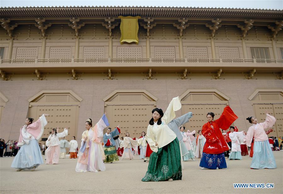 <?php echo strip_tags(addslashes(People wearing Hanfu, Chinese traditional costume, perform during an event in front of the Danfeng gate of Daming Palace National Heritage Park in Xi'an, northwest China's Shaanxi Province, Nov. 24, 2018. More than 400 Hanfu lovers attended the event to promote traditional Chinese culture. (Xinhua/Liu Xiao))) ?>