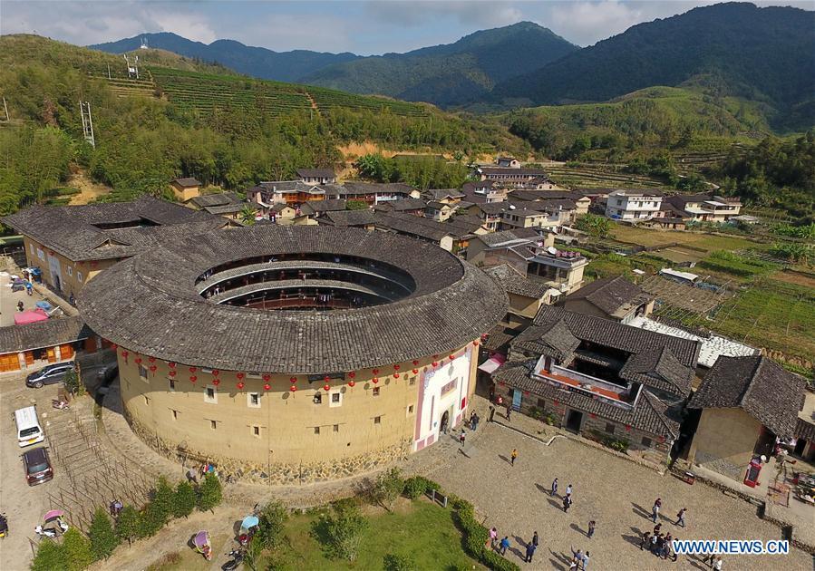 Photo taken on Nov. 23, 2018 shows Huaiyuan Tulou in Kanxia Village in Nanjing County of Zhangzhou City, southeast China\'s Fujian Province. Fujian Tulou, which dates back to Song and Yuan dynasties, is a type of Chinese rural dwellings of the Hakka people in the mountainous areas in Fujian Province. The layout of Fujian Tulou followed the Chinese dwelling tradition of \