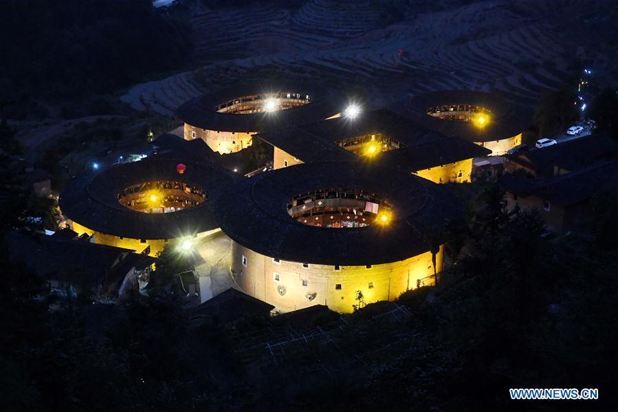 Photo taken on Nov. 23, 2018 shows a Tulou complex in Zhangzhou City, southeast China\'s Fujian Province. Fujian Tulou, which dates back to Song and Yuan dynasties, is a type of Chinese rural dwellings of the Hakka people in the mountainous areas in Fujian Province. The layout of Fujian Tulou followed the Chinese dwelling tradition of \