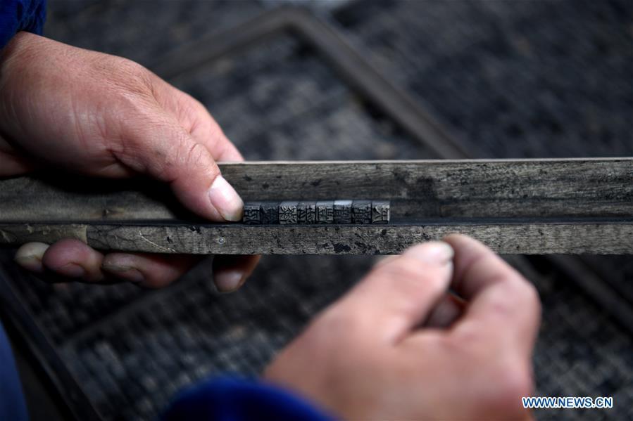 <?php echo strip_tags(addslashes(Lei Shitai works in Chanshan Village of Qinxi Town, Jingxian County, in east China's Anhui Province, Nov. 23, 2018. Lei, 52, born in neighboring Jiangxi Province, started his career as a typography printer when he finished his apprenticeship with his uncle who he followed since he was 17. The traditional printing method witnessed an increasingly hard time in the recent years as a livelihood. It was in 2017 when he decided to move to Chanshan at the invitation of Kai Yuanhong, a local cabinet maker, to cooperate in a broader way. Lei is now working with the traditional technique in a larger scale. (Xinhua/Liu Junxi))) ?>
