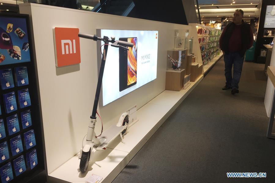 Photo taken on Nov. 25, 2018 shows a Mi product in a shopping mall in Barcelona, Spain. More and more Spanish consumers accept Chinese high-tech brands, which now can be seen in daily life across Spain. (Xinhua/Zheng Huansong)