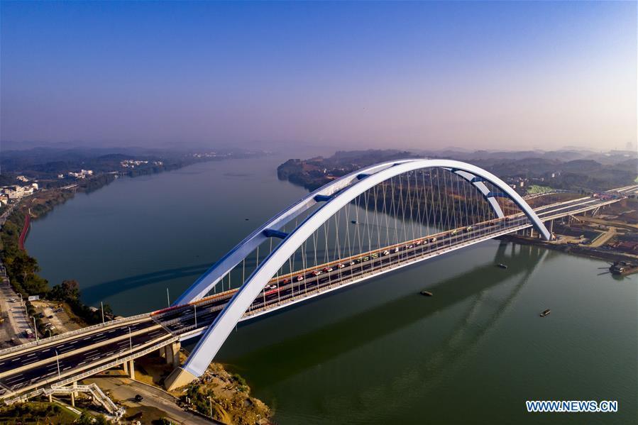 <?php echo strip_tags(addslashes(Aerial photo taken on Nov. 27, 2018 shows the Guantang bridge in Liuzhou, south China's Guangxi Zhuang Autonomous Region. The bridge, spanning over a distance of 457 meters, opened to traffic on Tuesday. (Xinhua/Li Bin))) ?>