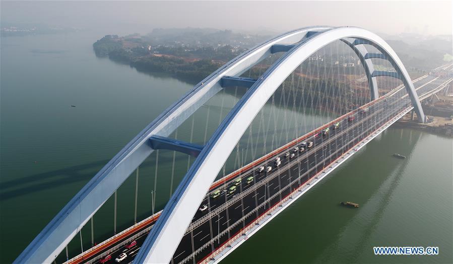 <?php echo strip_tags(addslashes(Aerial photo taken on Nov. 27, 2018 shows the Guantang bridge in Liuzhou, south China's Guangxi Zhuang Autonomous Region. The bridge, spanning over a distance of 457 meters, opened to traffic on Tuesday. (Xinhua/Li Hanchi))) ?>