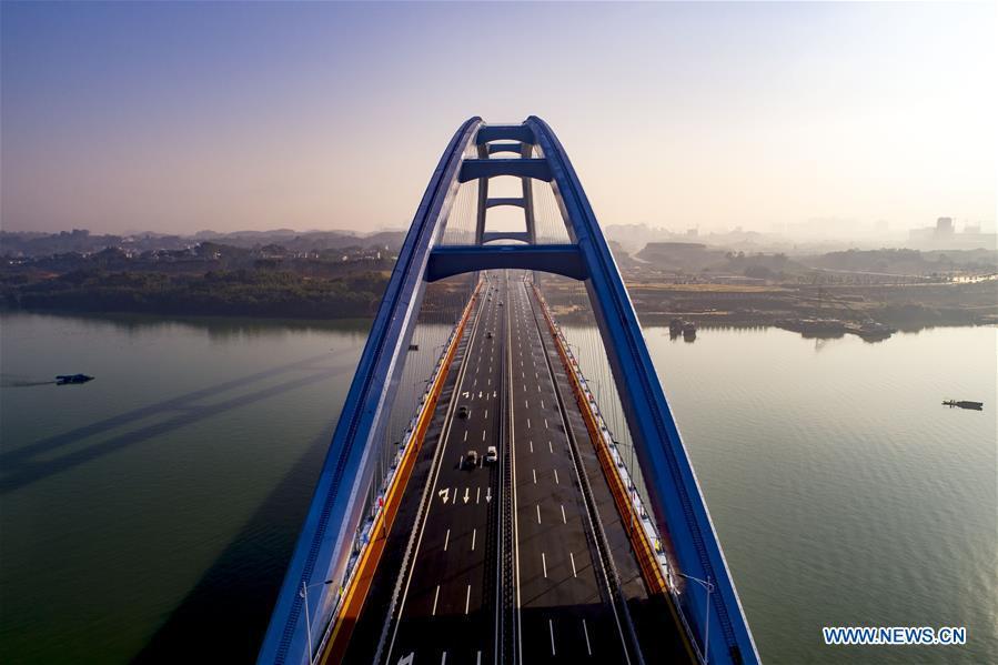 <?php echo strip_tags(addslashes(Aerial photo taken on Nov. 27, 2018 shows the Guantang bridge in Liuzhou, south China's Guangxi Zhuang Autonomous Region. The bridge, spanning over a distance of 457 meters, opened to traffic on Tuesday. (Xinhua/Li Bin))) ?>