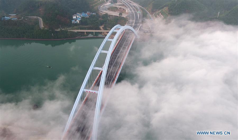 <?php echo strip_tags(addslashes(Aerial photo taken on Nov. 27, 2018 shows the Guantang bridge in Liuzhou, south China's Guangxi Zhuang Autonomous Region. The bridge, spanning over a distance of 457 meters, opened to traffic on Tuesday. (Xinhua/Li Hanchi))) ?>