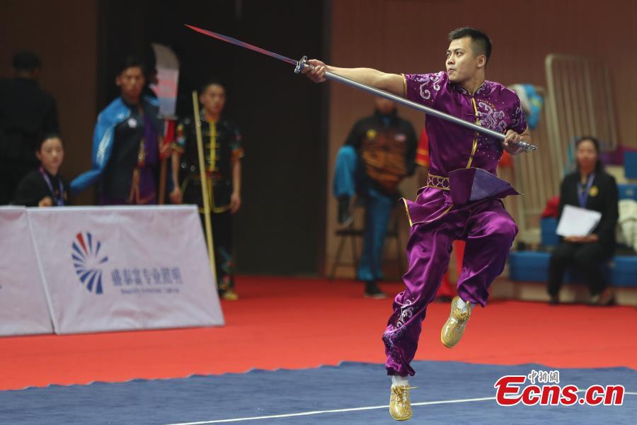 An athlete competes at the first Asian Traditional Wushu (Kungfu) Championship in Nanjing, East China’s Jiangsu province on November 29, 2018. The event attracts athletes from 12 countries and regions including China, Brunei, India, Japan, and Kazakhstan to take part in. (Photo: China News Service/ Yang Bo)