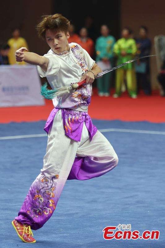 An athlete competes at the first Asian Traditional Wushu (Kungfu) Championship in Nanjing, East China’s Jiangsu province on November 29, 2018. The event attracts athletes from 12 countries and regions including China, Brunei, India, Japan, and Kazakhstan to take part in. (Photo: China News Service/ Yang Bo)