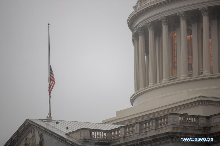 The U.S. national flag is seen at half-staff on the Capitol Hill in tribute to former U.S. President George H. W. Bush in Washington D.C. Dec. 1, 2018. (Xinhua/Ting Shen)