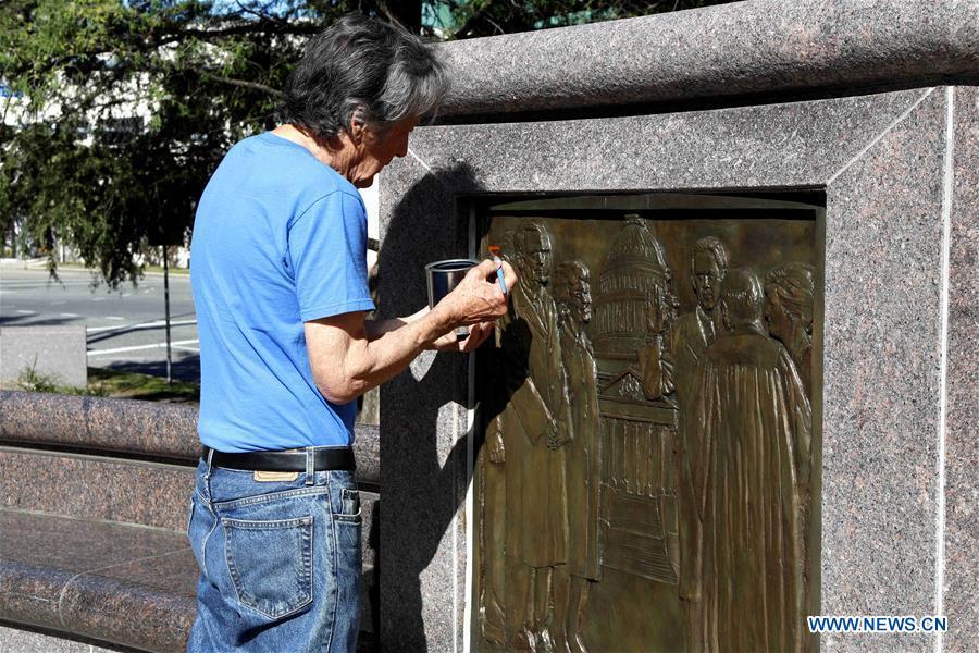<?php echo strip_tags(addslashes(A Houston municipal staff member cleans a relief of former U.S. President George H.W. Bush in Houston, Texas, the United States, on Dec. 1, 2018. George H.W. Bush, the 41st president of the United States, has died Friday at the age of 94, according to a statement from his office. (Xinhua/Steven Song))) ?>