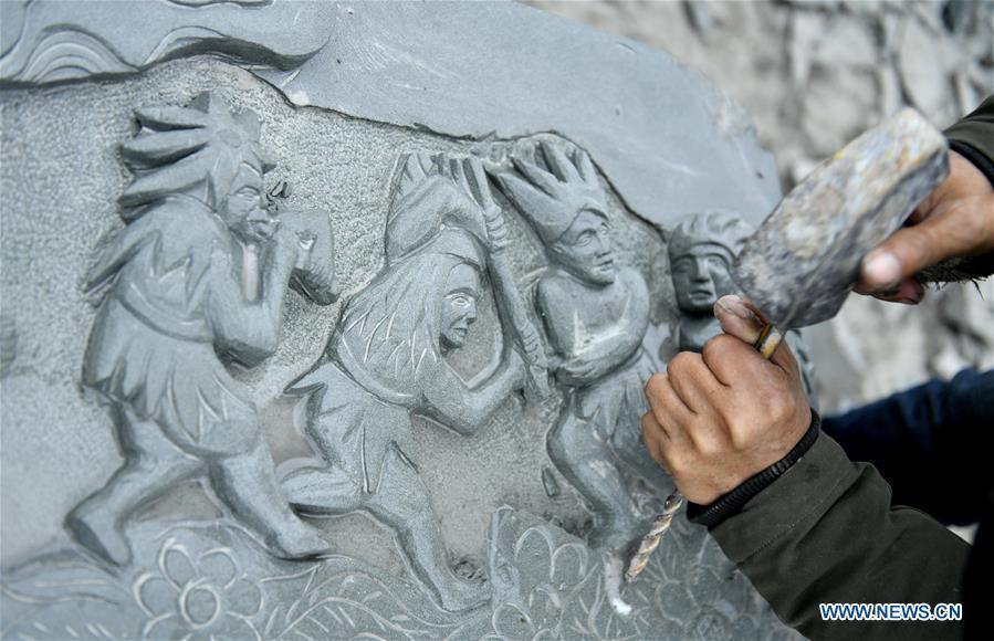<?php echo strip_tags(addslashes(A handicraftsman processes a rock carving work in Longdong Village of Xuan'en County in Enshi Tujia and Miao Autonomous Prefecture, central China's Hubei Province, Dec. 5, 2018. Residents here benefit from the rich rock resources and turn plain rocks into delicate artworks. (Xinhua/Song Wen))) ?>