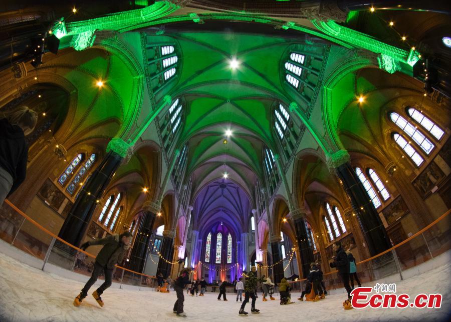 <?php echo strip_tags(addslashes(People skate on a temporary ice rink in the Gouwe Kerk church, a Gothic Revival church built between 1902 and 1904, in the center of Gouda, central Netherlands, Wednesday, Dec. 5, 2018. The ice rink will remain in the church till Dec. 16, and from Dec. 19, people can enjoy skating on the rink in front of the historic town hall of Gouda. (Photo/Agencies))) ?>