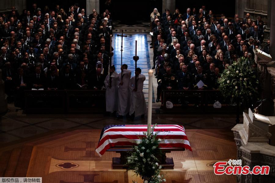 The flag-draped casket of former President George H.W. Bush during a State Funeral at the National Cathedral, Wednesday, Dec. 5, 2018, in Washington.(Photo/Agencies)

In laughter and tears, the United States held a state funeral here Wednesday for the 41st President George H.W. Bush, who has been widely mourned and praised as a good leader and a devoted person with a \