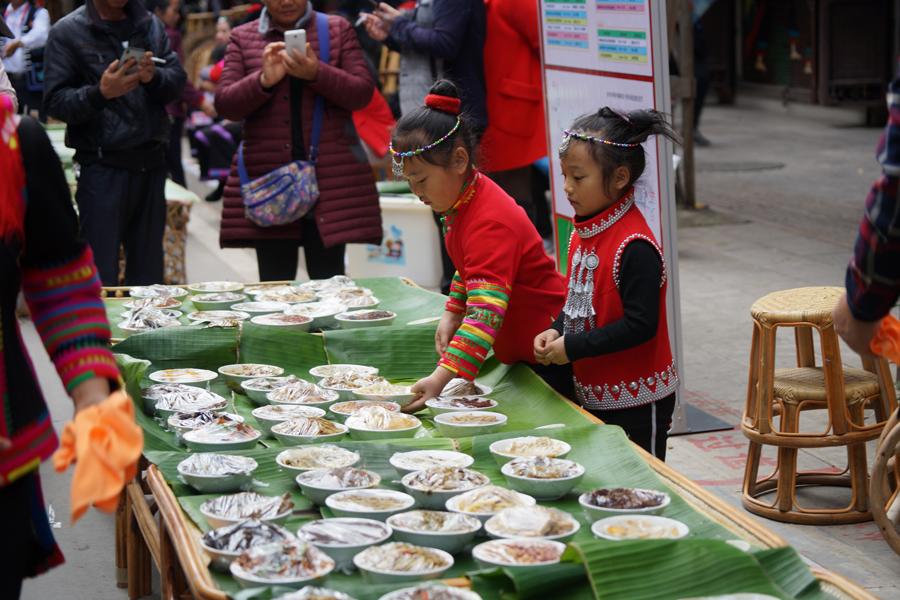 <?php echo strip_tags(addslashes(Hani people in Southwest China's Yunnan Province attend a long-table banquet to celebrate their week-long new year festival on Nov 30, 2018.  (Photo by Li Min/For chinadaily.com.cn))) ?>
