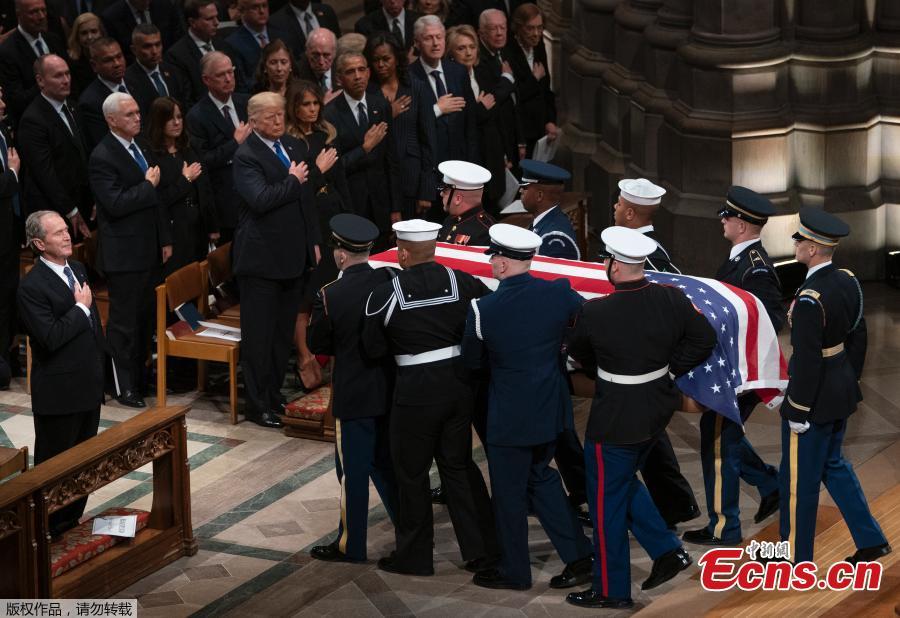 The flag-draped casket of former President George H.W. Bush is carried by a joint services military honor guard during a departure ceremony at Andrews Air Force Base, Md., Wednesday, Nov. 5, 2018.(Photo/Agencies)