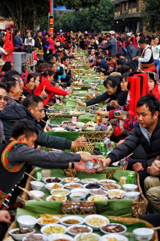 <?php echo strip_tags(addslashes(Hani people in Southwest China's Yunnan Province attend a long-table banquet to celebrate their week-long new year festival on Nov. 30, 2018. (Photo by Li Min/For chinadaily.com.cn))) ?>