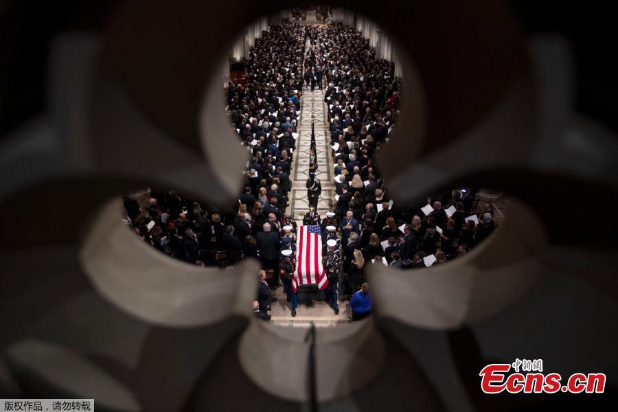 The casket of former US president George H. W. Bush is seen during his state funeral at the National Cathedral in Washington, DC on December 5, 2018.(Photo/Agencies)