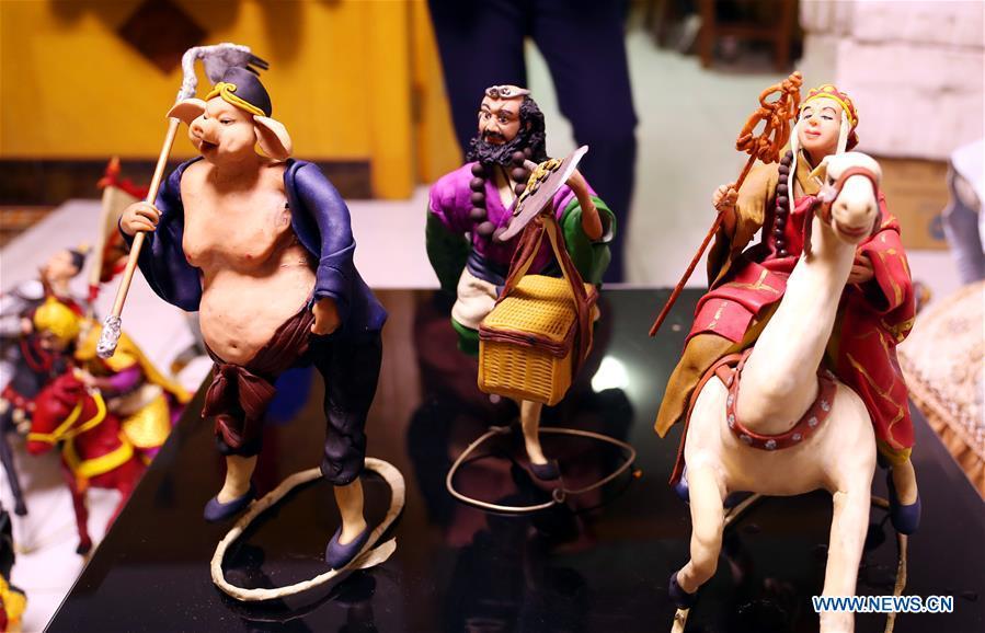 Dough figurines made by folk artist Du Lihua are seen in Nanzhang Village of Jingxing County, north China\'s Hebei Province, Dec. 5, 2018. Du Lihua, 41, is a folk artist for dough sculpture of Nanzhang Village, which is listed as provincial-level intangible cultural heritage. Du has made dough sculptures for over 10 years and created various dough figurines. (Xinhua/Zhang Xiuke)