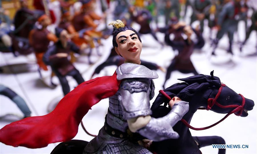 A dough figurine made by folk artist Du Lihua is seen in Nanzhang Village of Jingxing County, north China\'s Hebei Province, Dec. 5, 2018. Du Lihua, 41, is a folk artist of dough sculpture of Nanzhang Village, which is listed as provincial-level intangible cultural heritage. Du has made dough sculptures for over 10 years and created various dough figurines. (Xinhua/Zhang Xiuke)