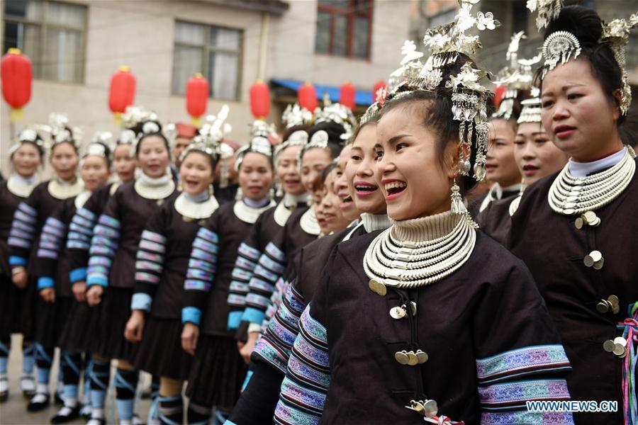 Women dressed in festive costumes attend an activity to celebrate the new year of Dong ethnic group at Jiasuo Dong Village of Zhongchao Township in Liping County, southwest China\'s Guizhou Province, Dec. 9, 2018. Dong people celebrated the new year through various activities on Dec. 7-9. (Xinhua/Yang Wenbin)