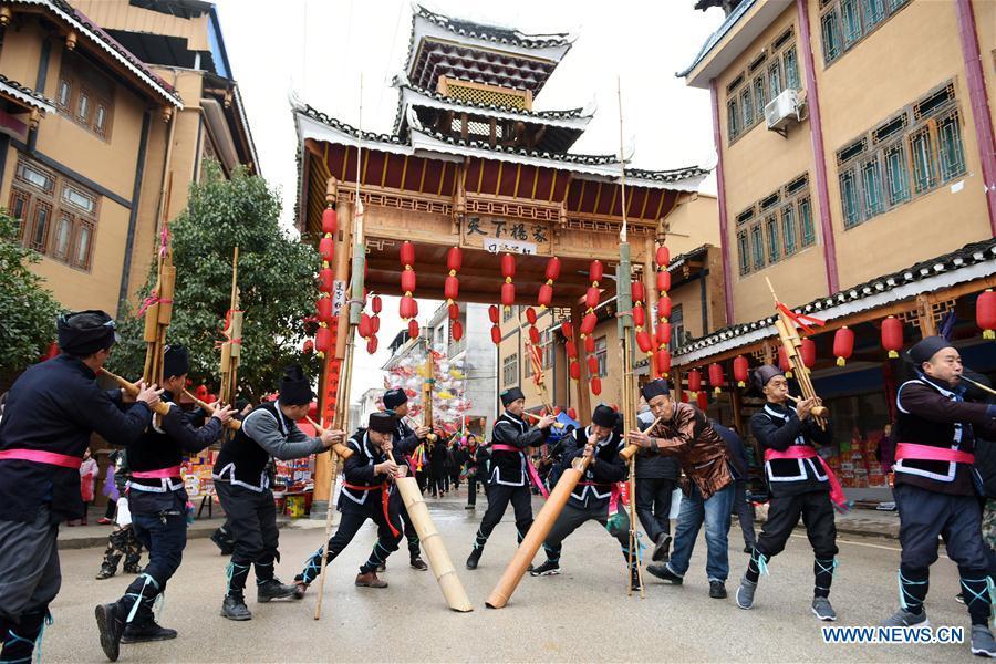 People of Dong ethnic group play Lusheng to welcome guests at Jiasuo Dong Village of Zhongchao Township in Liping County, southwest China\'s Guizhou Province, Dec. 9, 2018. Dong people celebrated the new year through various activities on Dec. 7-9. (Xinhua/Yang Wenbin)