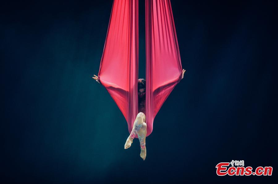 Photo taken on Dec. 10, 2018 shows the first China Dancing in Midair Championship in Tianjin. The two-day competition attracted 57 contestants in seven events where they performed with different items suspended in midair, such as belts, hammock, rings and net. (Photo: China News Service/Tong Yu)