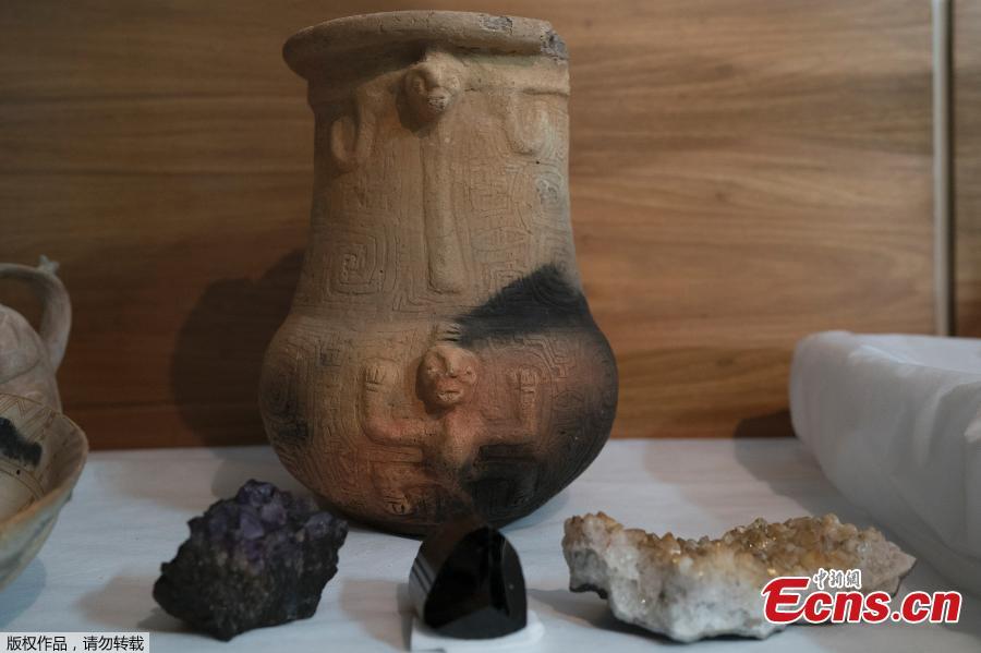 An urn of Marajoara ethnicity rescued from the ashes of the fire that swept through Rio’s National Museum in September, is displayed during a media presentation, in Rio de Janeiro, Brazil, Dec. 10, 2018. The director of the National Museum and the German consul hosted the press conference to announce their partnership for the reconstruction of the museum. (Photo/Agencies)