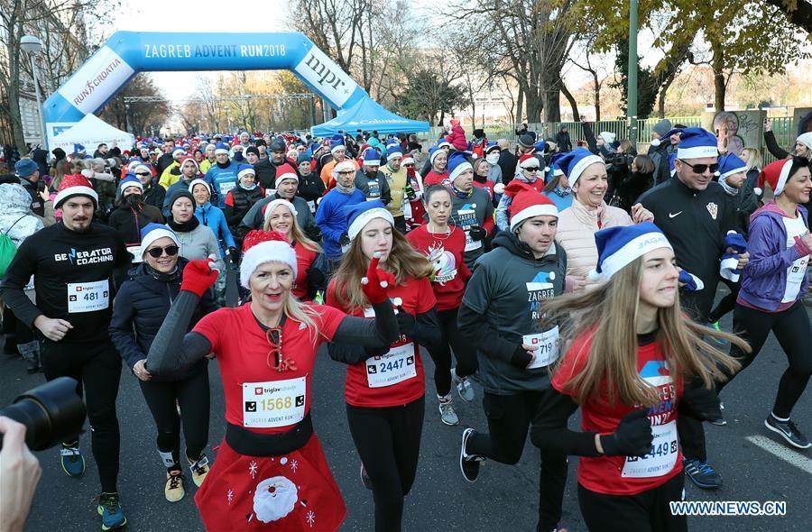 People take part in the third edition of Zagreb Advent Run in Zagreb, Croatia, on Dec. 16, 2018. More than 2,500 participants took part in the race on Sunday to raise funds for fighting diabetes. (Xinhua/Sanjin Strukic)