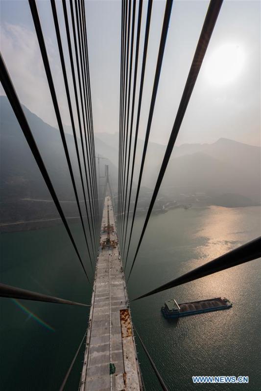 <?php echo strip_tags(addslashes(Photo taken on Dec. 16, 2018 shows the Xiangxi River Bridge in Zigui County of Yichang City, central China's Hubei Province. The closure of the bridge with a 470-meter main span was finished on Sunday. (Xinhua/Zheng Jiayu))) ?>
