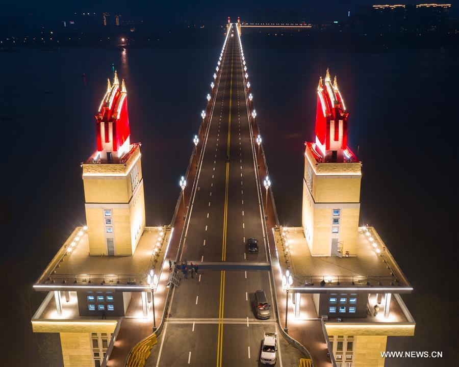 Aerial photo taken on Dec. 16. 2018 shows night view of Nanjing Yangtze River Bridge after renovation in Nanjing, east China\'s Jiangsu Province. (Xinhua/Su Yang)