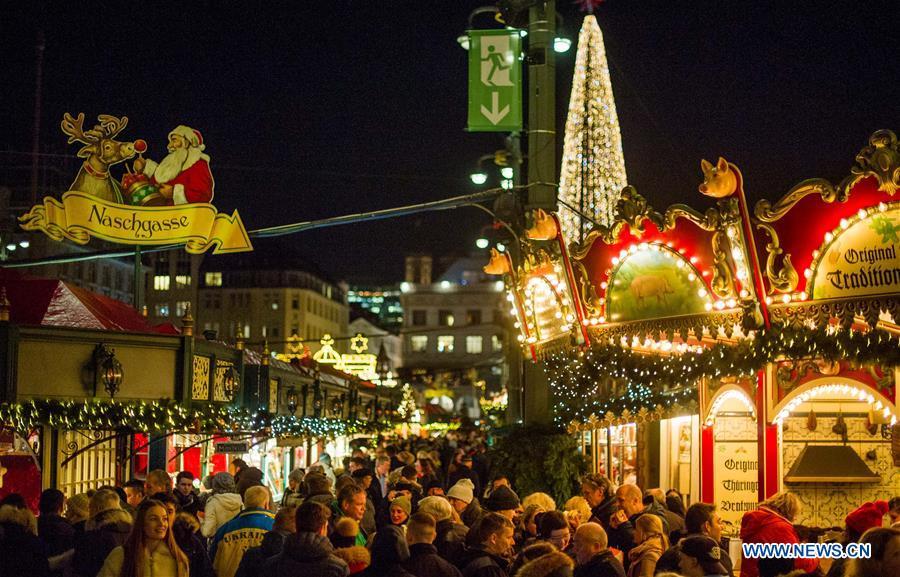 People visit a Christmas market in Hamburg, Germany, Dec. 18, 2018. There are more than 10 Christmas markets in Hamburg at present, making it a famous winter tourist city in Germany. (Xinhua/Lian Zhen)