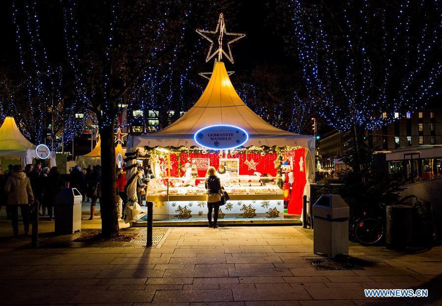 <?php echo strip_tags(addslashes(People visit a Christmas market in Hamburg, Germany, Dec. 18, 2018. There are more than 10 Christmas markets in Hamburg at present, making it a famous winter tourist city in Germany. (Xinhua/Lian Zhen))) ?>