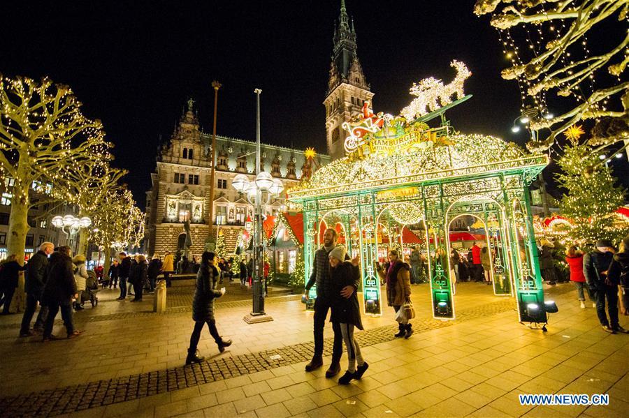 <?php echo strip_tags(addslashes(People visit a Christmas market in Hamburg, Germany, Dec. 18, 2018. There are more than 10 Christmas markets in Hamburg at present, making it a famous winter tourist city in Germany. (Xinhua/Lian Zhen))) ?>