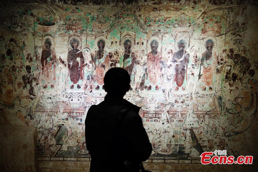<?php echo strip_tags(addslashes(An exhibition of Dunhuang art masterpieces in Shanghai, Dec. 20, 2018. The non-profit exhibition tour at universities brought 66 large-size digital high-definition murals from the Mogao Caves. (Photo: China News Service/Tang Yanjun))) ?>