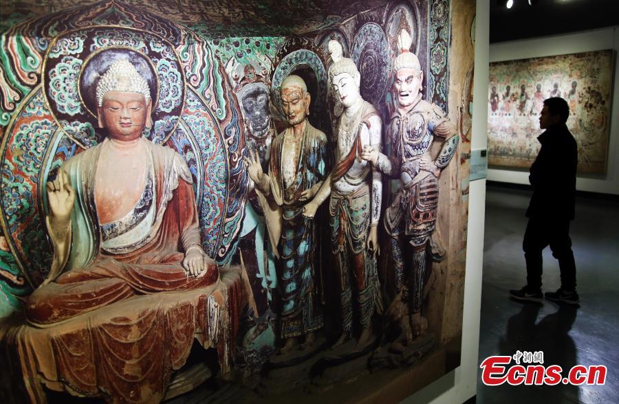 <?php echo strip_tags(addslashes(An exhibition of Dunhuang art masterpieces in Shanghai, Dec. 20, 2018. The non-profit exhibition tour at universities brought 66 large-size digital high-definition murals from the Mogao Caves. (Photo: China News Service/Tang Yanjun))) ?>