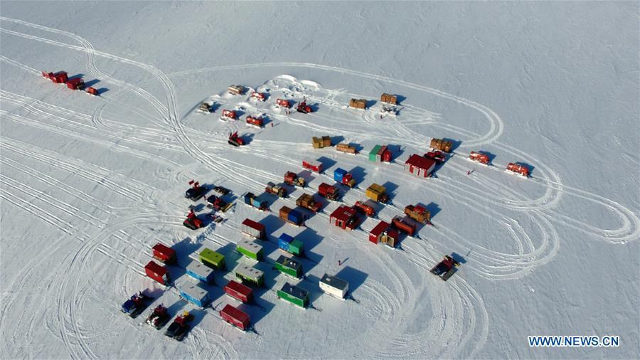 Aerial photo taken on Dec. 19, 2018 shows two inland expedition teams Taishan and Kunlun of China\'s 35th research expedition in Antarctica. (Xinhua/Liu Shiping)