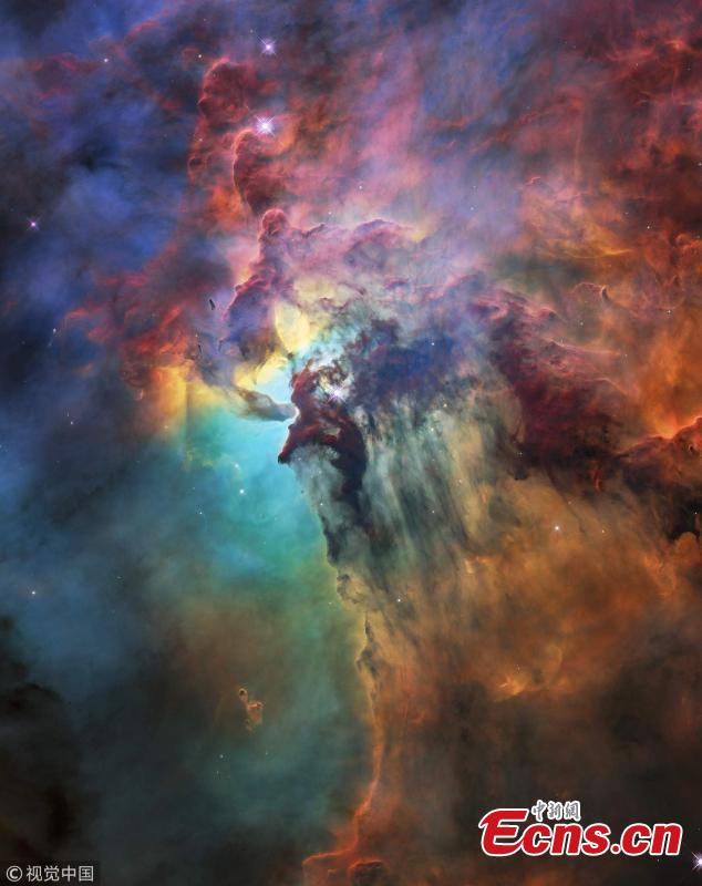 Ultraviolet radiation and stellar winds from a giant star called Herschel 36 push through dust in curtain-like sheets in the Lagoon Nebula stellar nursery, located 4,000 light years away, in this Hubble Space Telescope image obtained Sept. 26, 2018. (Photo/Agencies)